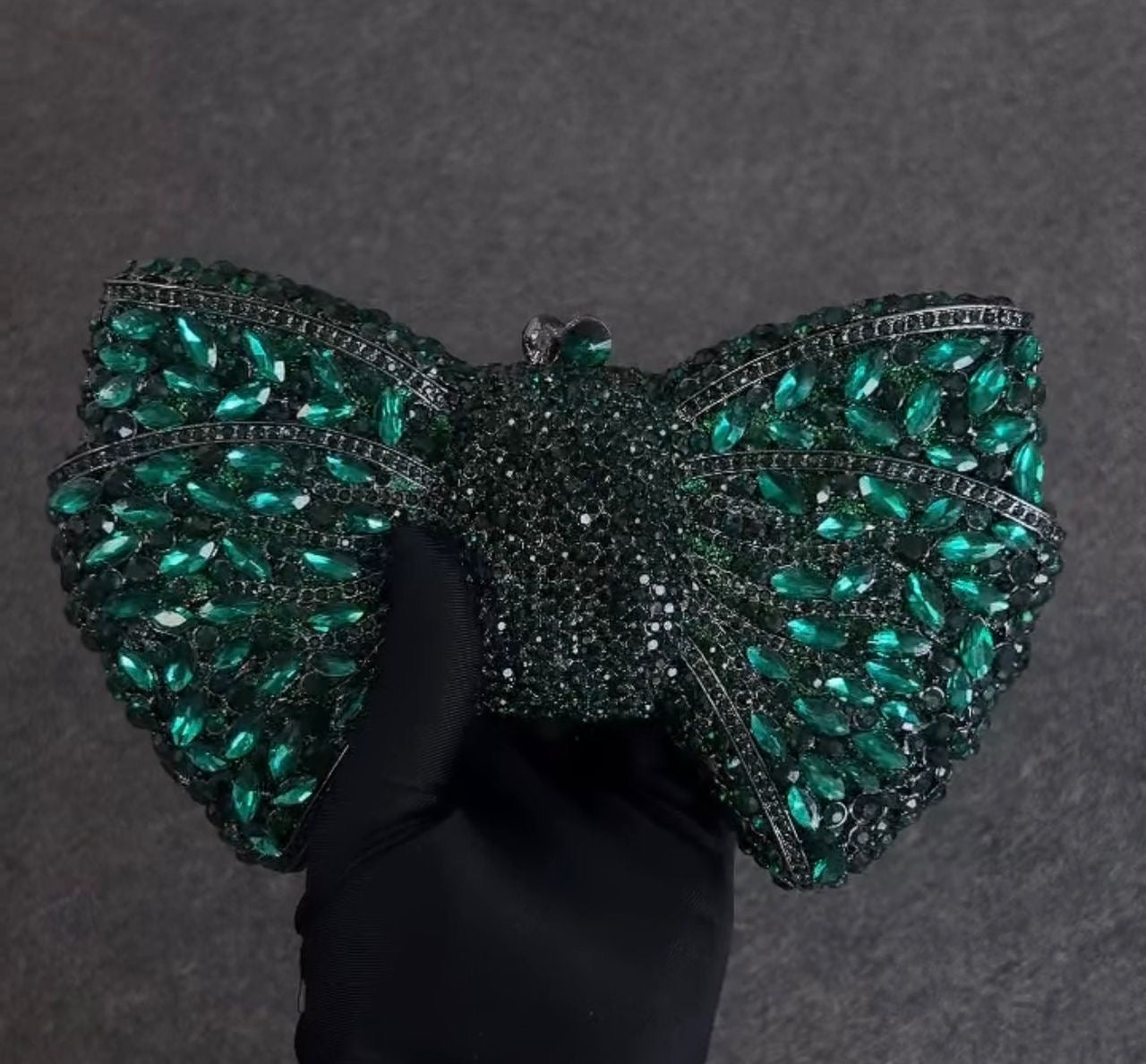 stunning butterfly design, fully embellished with sparkling stones for a bold, luxurious statement
