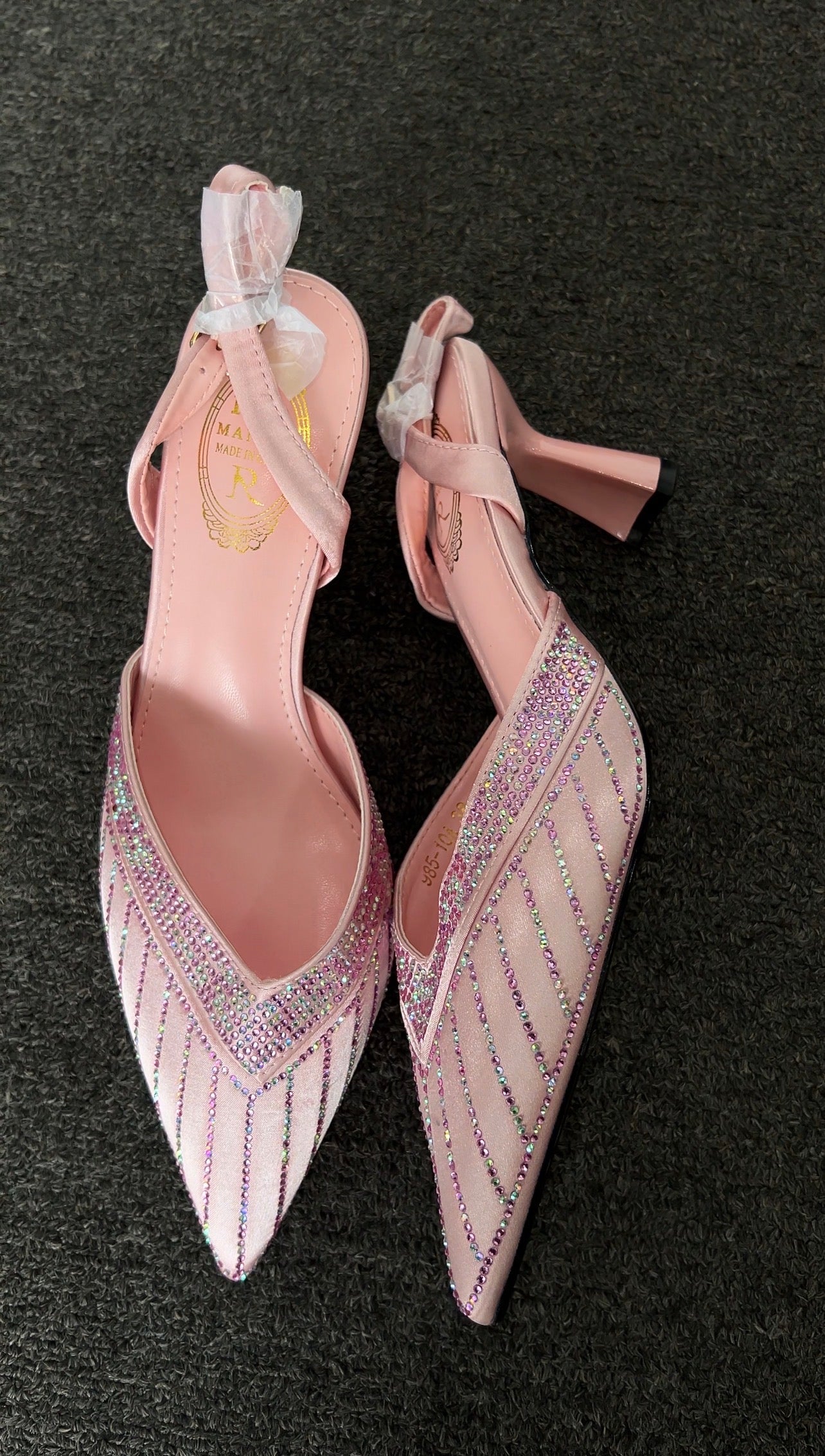 The heel provides both a contemporary edge and superior stability. Perfect for spring weddings, bridal showers, or garden parties.