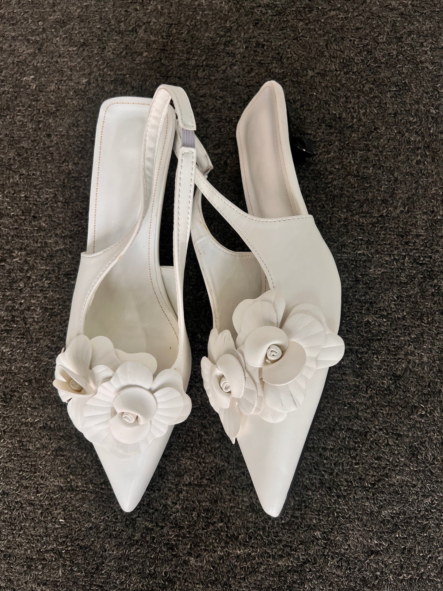 These heels are a fantastic choice for brides looking for a chic reception shoe, bridesmaids, or professionals attending a garden party.