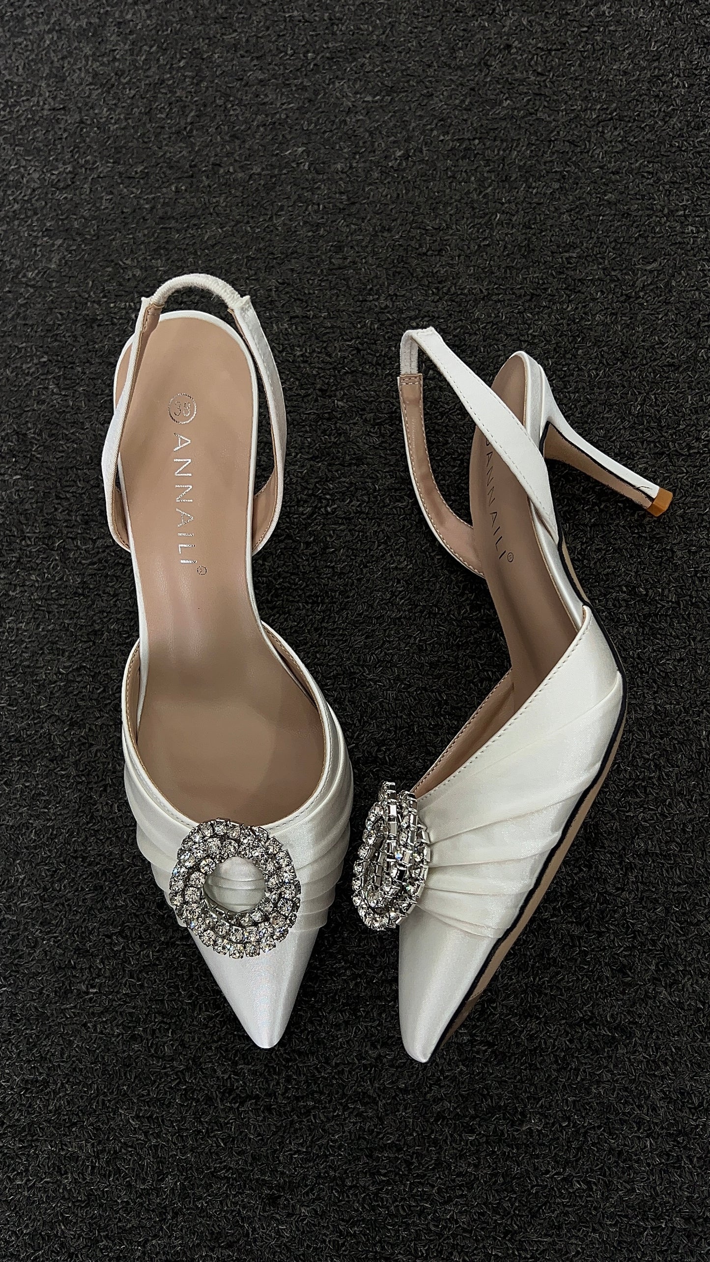 these shoes offer a timeless aesthetic for the modern minimalist bride. Receptions, bridal showers, or pairing with a sleek silk gown.