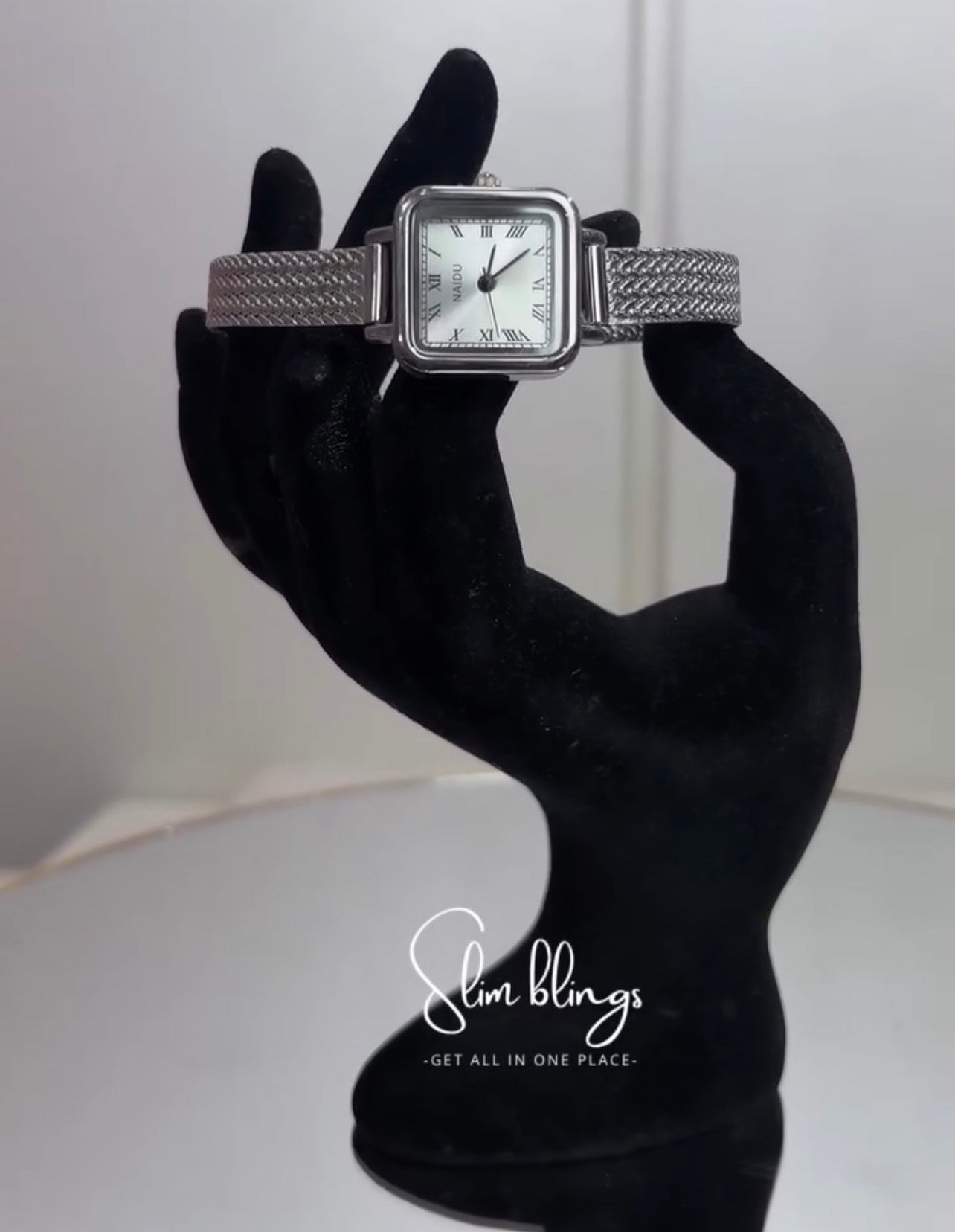 The uniquely patterned silver mesh strap contours perfectly to the wrist