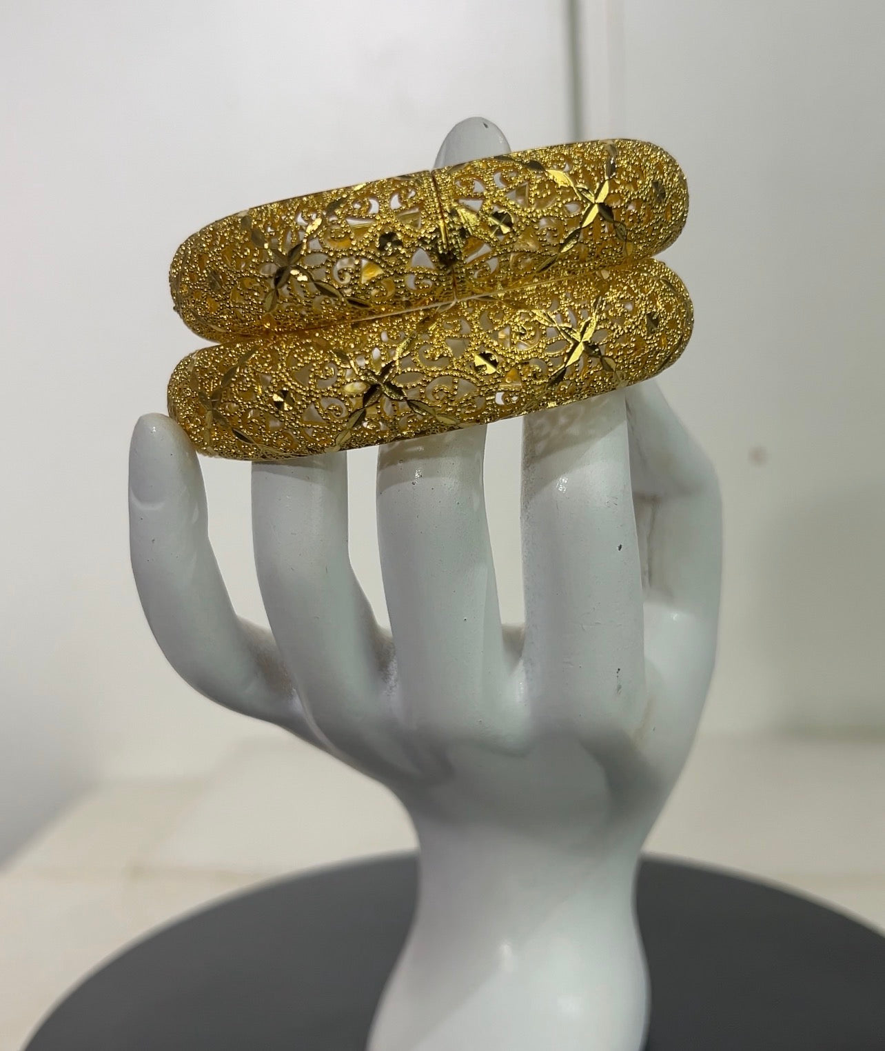 Perfect for brides, wedding guests, and traditional festive celebrations, each set comes with two matching bangles designed to be worn together or stacked for a regal, high-glamour look.