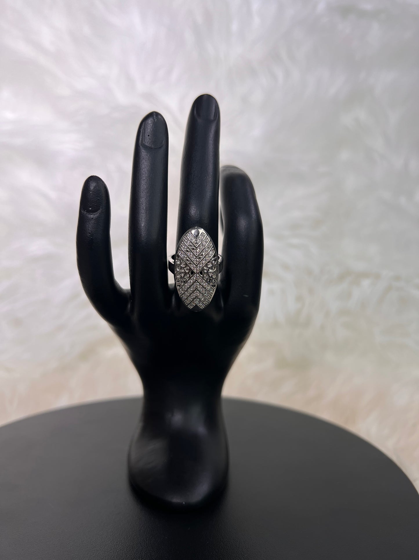 Perfect for brides looking for a touch of classic glamour or anyone wanting to add a dramatic focal point to their evening wear.