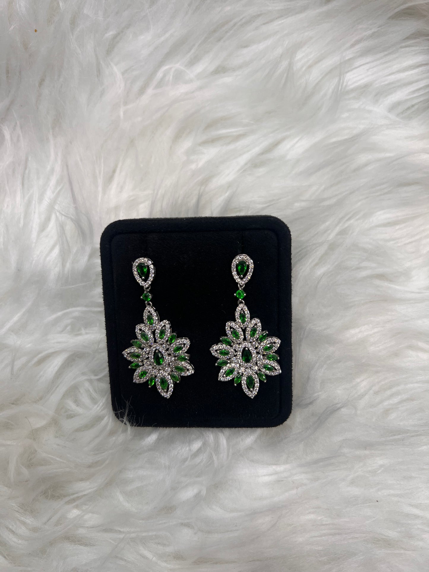 These dramatic chandelier earrings are the ultimate statement piece for black-tie galas, holiday parties, or a sophisticated bridal look.