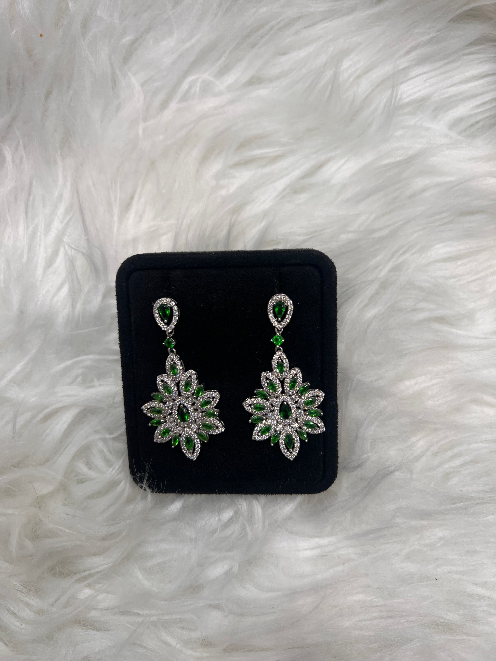 These dramatic chandelier earrings are the ultimate statement piece for black-tie galas, holiday parties, or a sophisticated bridal look.