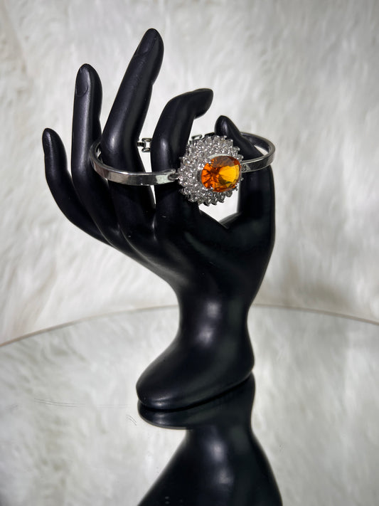 Adds a pop of regal warmth to black-tie attire, evening wear, or festive event outfits.