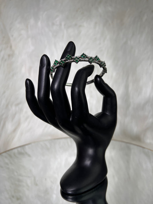 An absolute showstopper for formal occasions, black-tie galas, bridal parties, and holiday celebrations. Pair it with an understated cocktail dress or rich velvet ensembles to let the emerald hues stand out