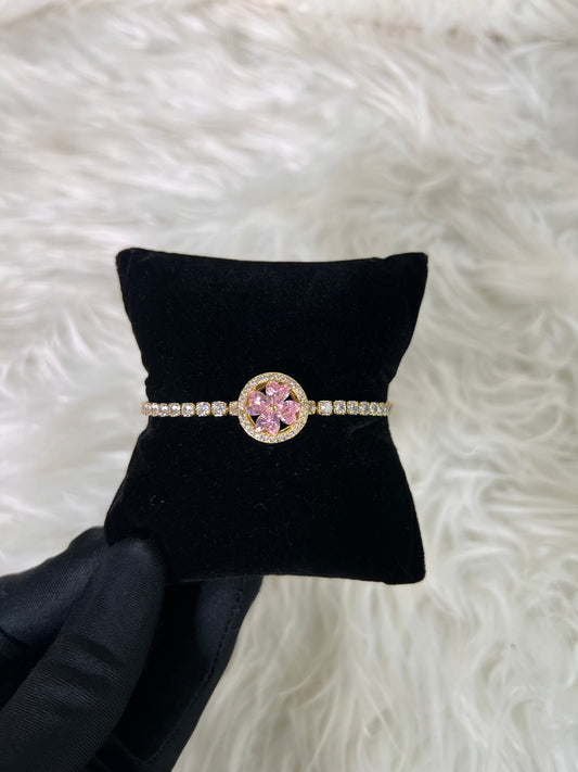 this piece brings a warm, feminine flourish to bridal party attire or milestone gifts.