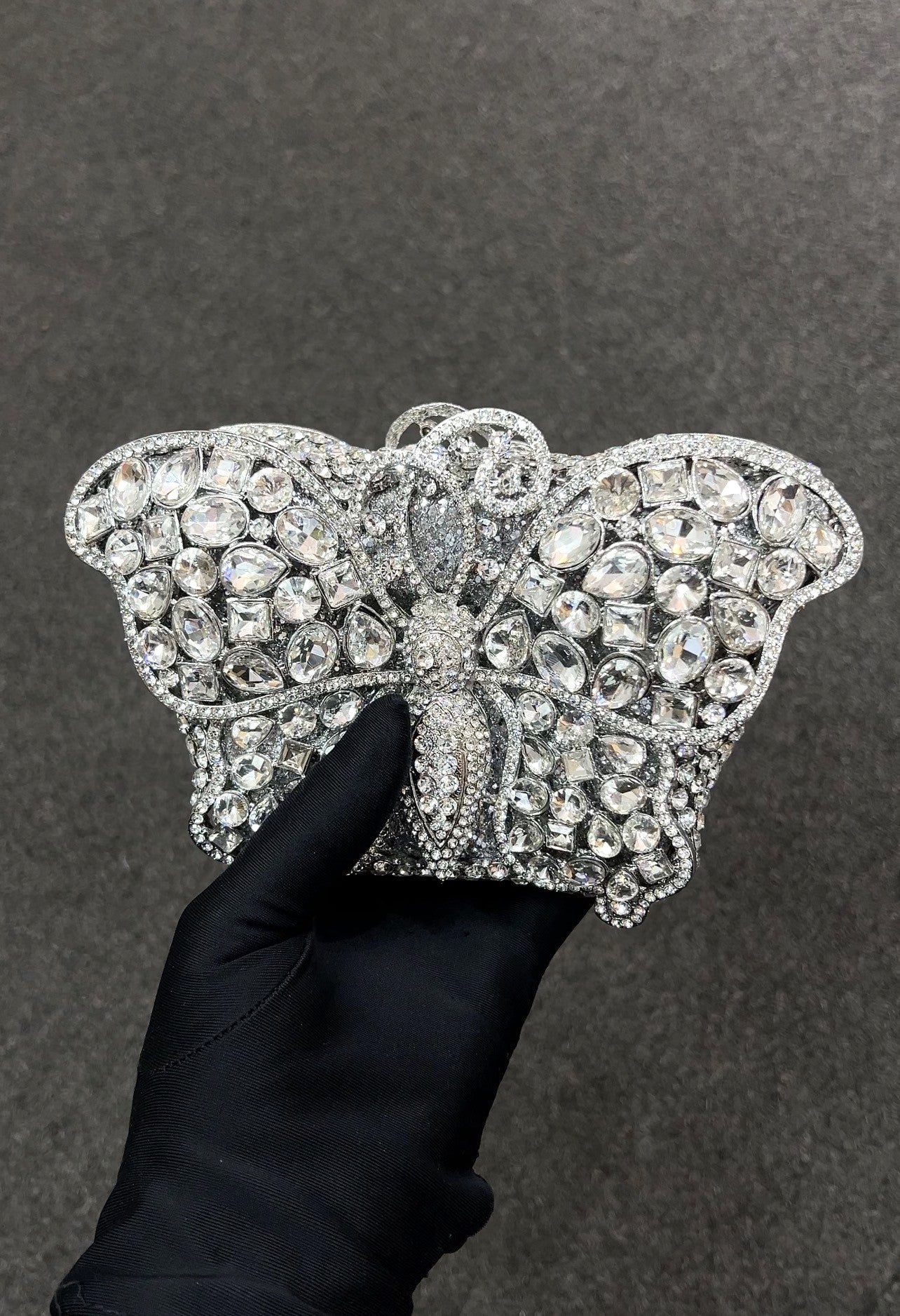This eye-catching piece adds a touch of glamour and elegance, perfect for special occasions and evening events