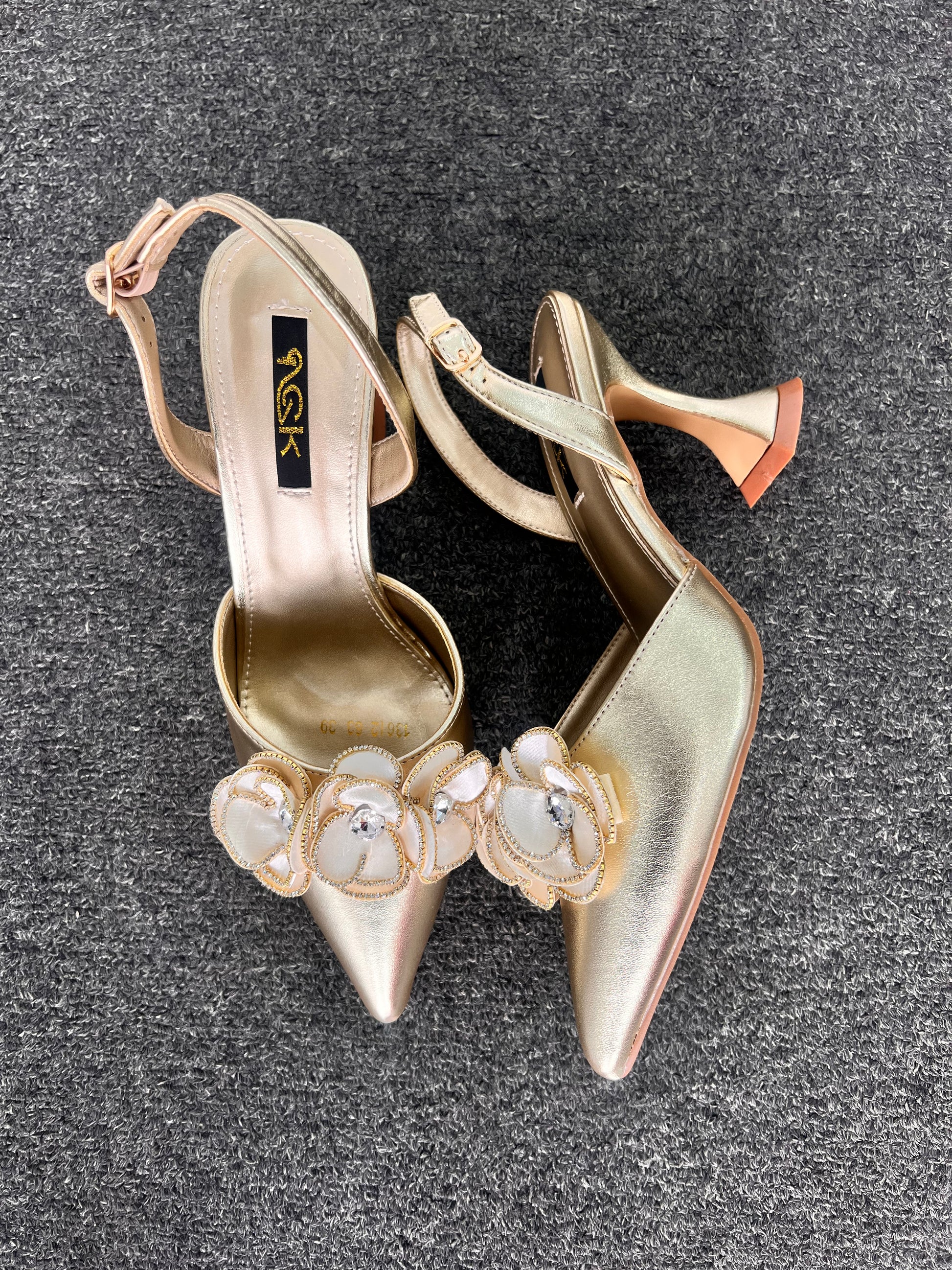 These heels are a standout choice for bridal showers, spring weddings, or formal evening galas.