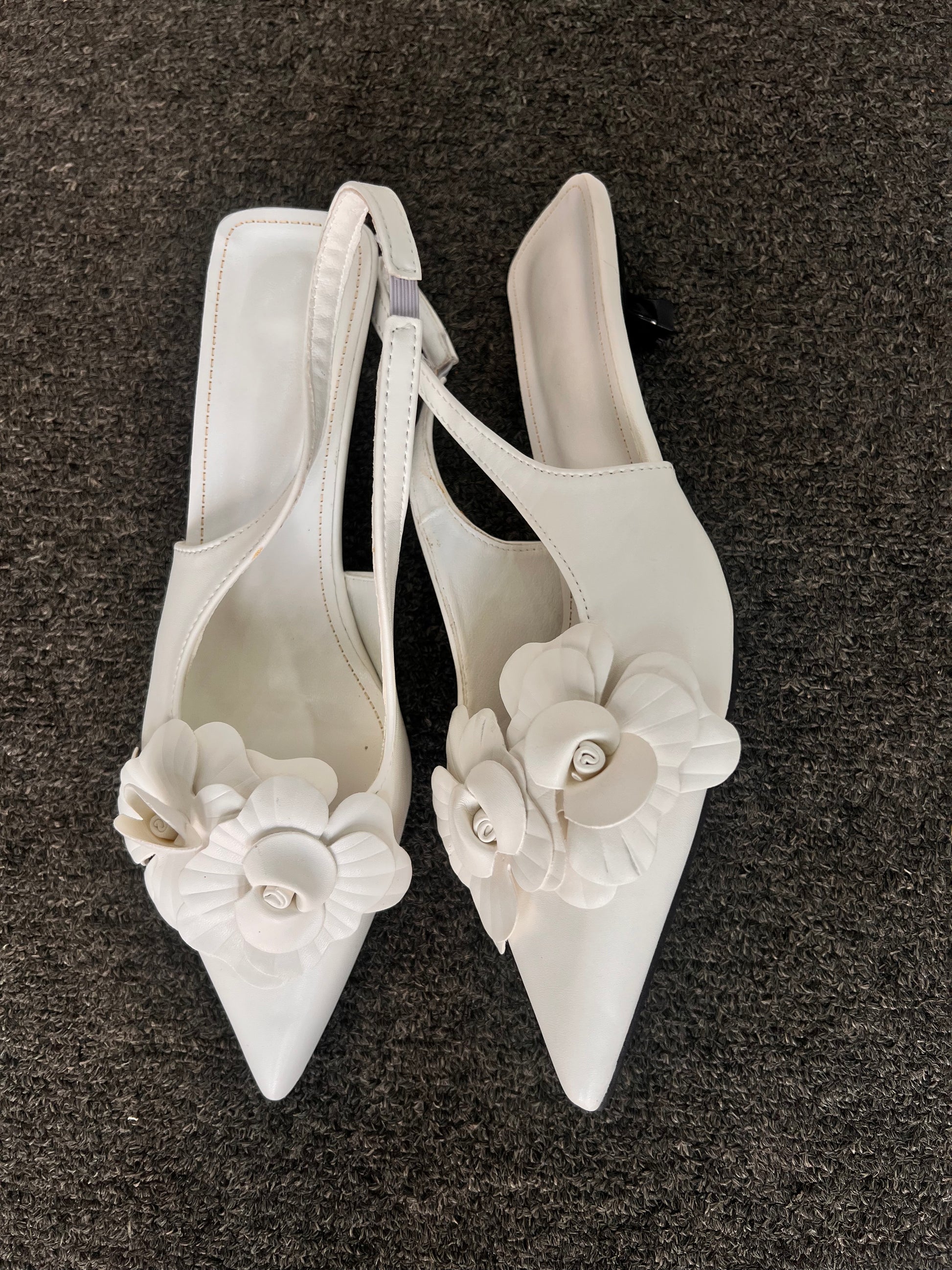 These heels are a fantastic choice for brides looking for a chic reception shoe, bridesmaids, or professionals attending a garden party.