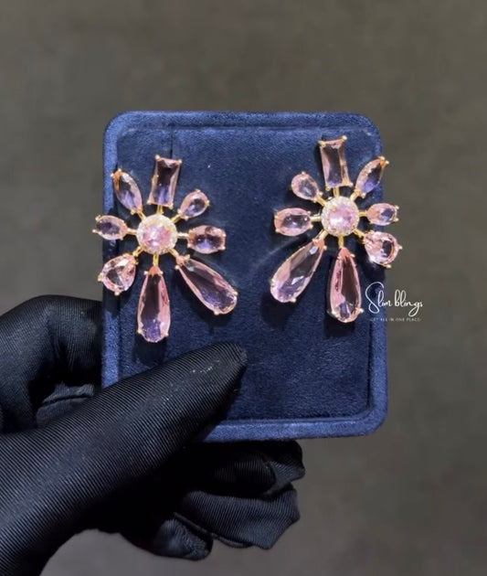 Pair of floral earrings with pink gemstones 