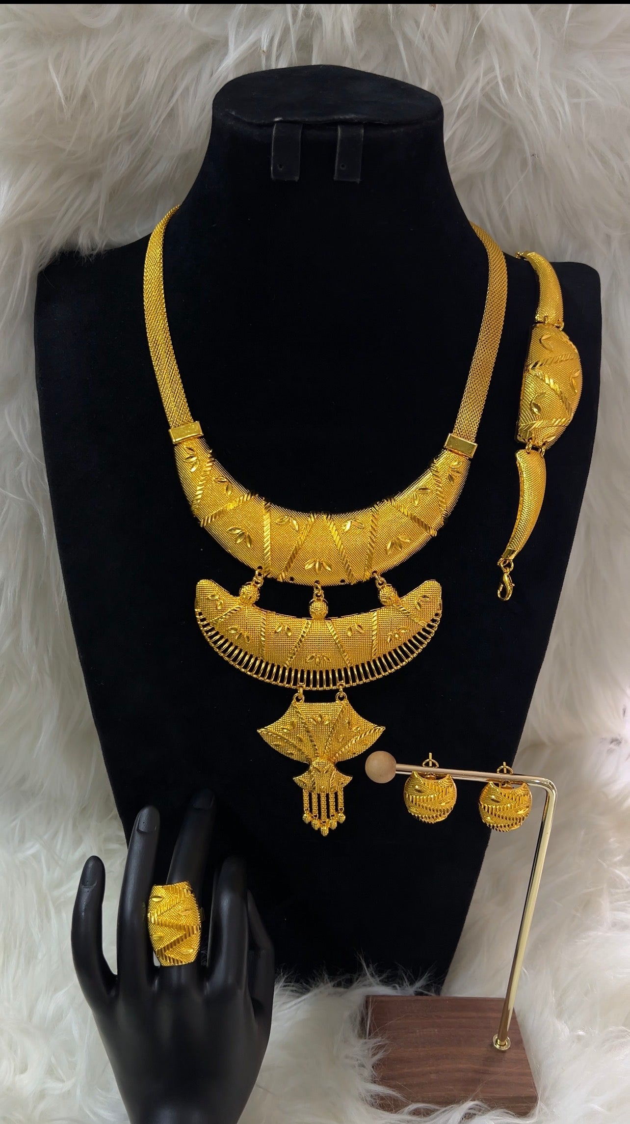 Gold necklace and ring set , perfect for weddings and special occasions.