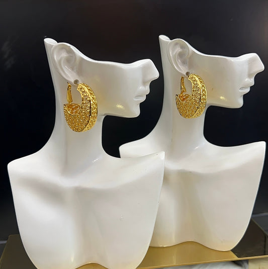 These earrings blend traditional filigree craftsmanship with a timeless silhouette, offering a bold yet elegant statement piece suitable for formal occasions or daily wear.