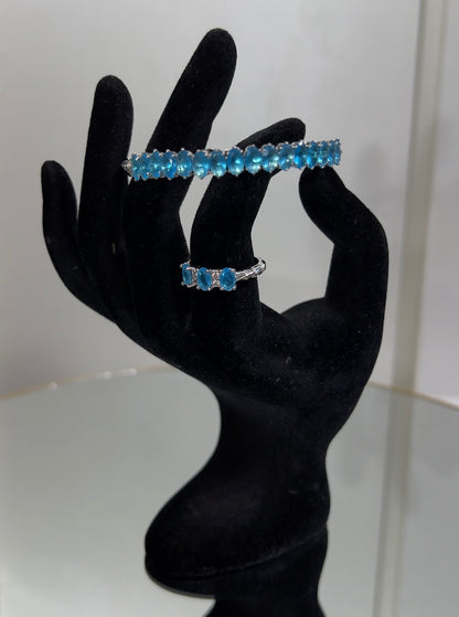 This  set is an exquisite choice for evening wear, gala events, holiday parties, or as a standout bridal accessory for a splash of color.