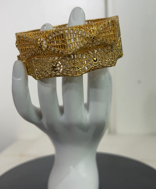 Perfect for brides, wedding guests, and traditional festive celebrations, each set comes with two matching bangles designed to be worn together or stacked for a regal, high-glamour look.
