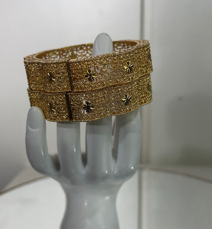 Perfect for brides, wedding guests, and traditional festive celebrations, each set comes with two matching bangles designed to be worn together or stacked for a regal, high-glamour look.