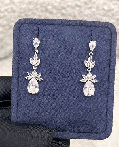 The meticulously polished prongs prevent snags on delicate silk or satin, while the secure post-back closures keep them comfortably and safely aligned.