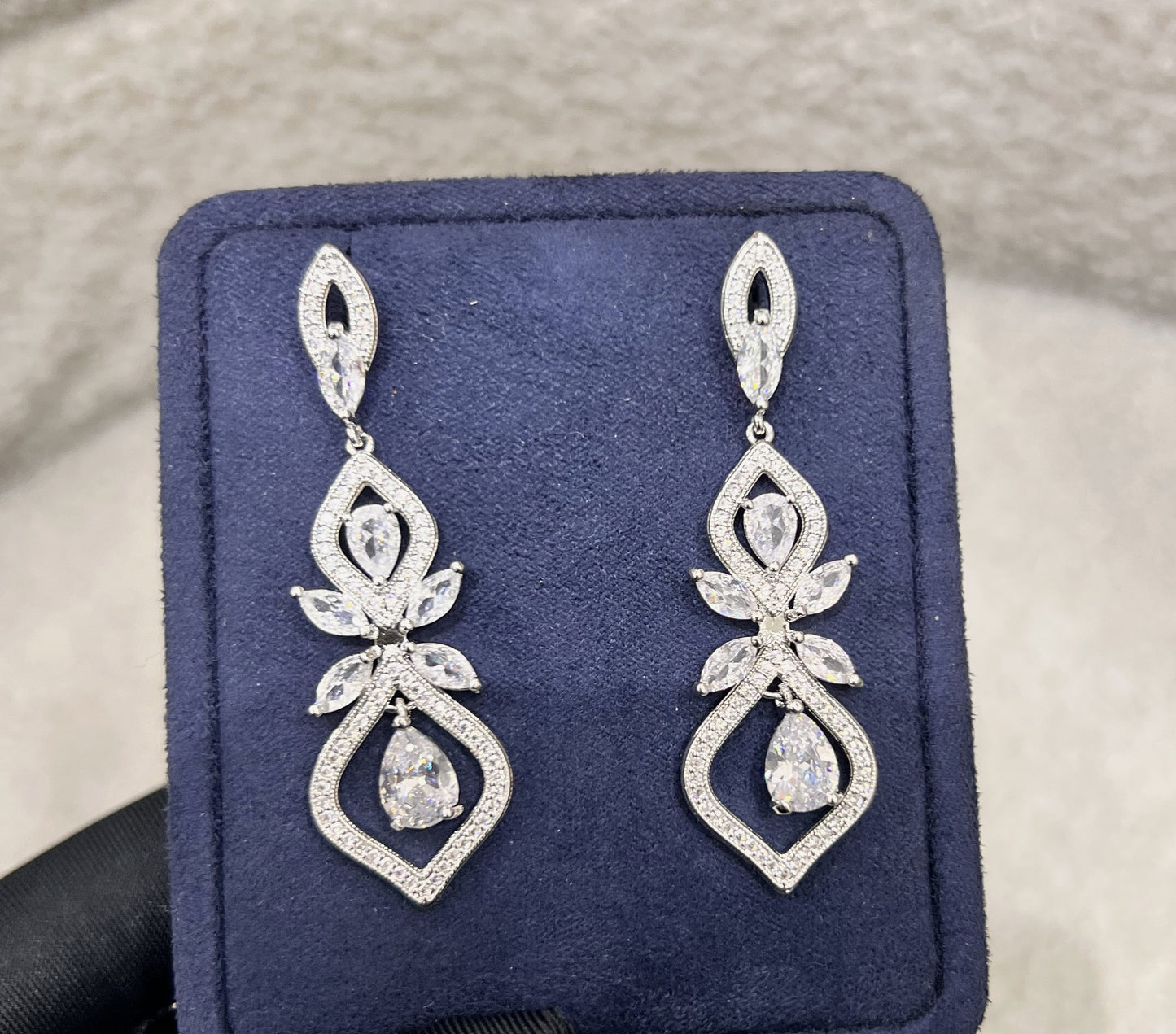 This open silhouette maximizes light reflection for an unforgettable sparkle while keeping the earrings incredibly light and comfortable for all-day wear.