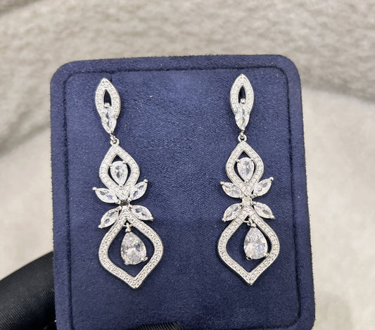 This open silhouette maximizes light reflection for an unforgettable sparkle while keeping the earrings incredibly light and comfortable for all-day wear.