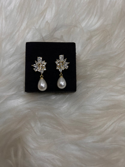 Pair of earrings, these earrings frame the face beautifully, pairing effortlessly with classic lace or modern satin bridal gowns.