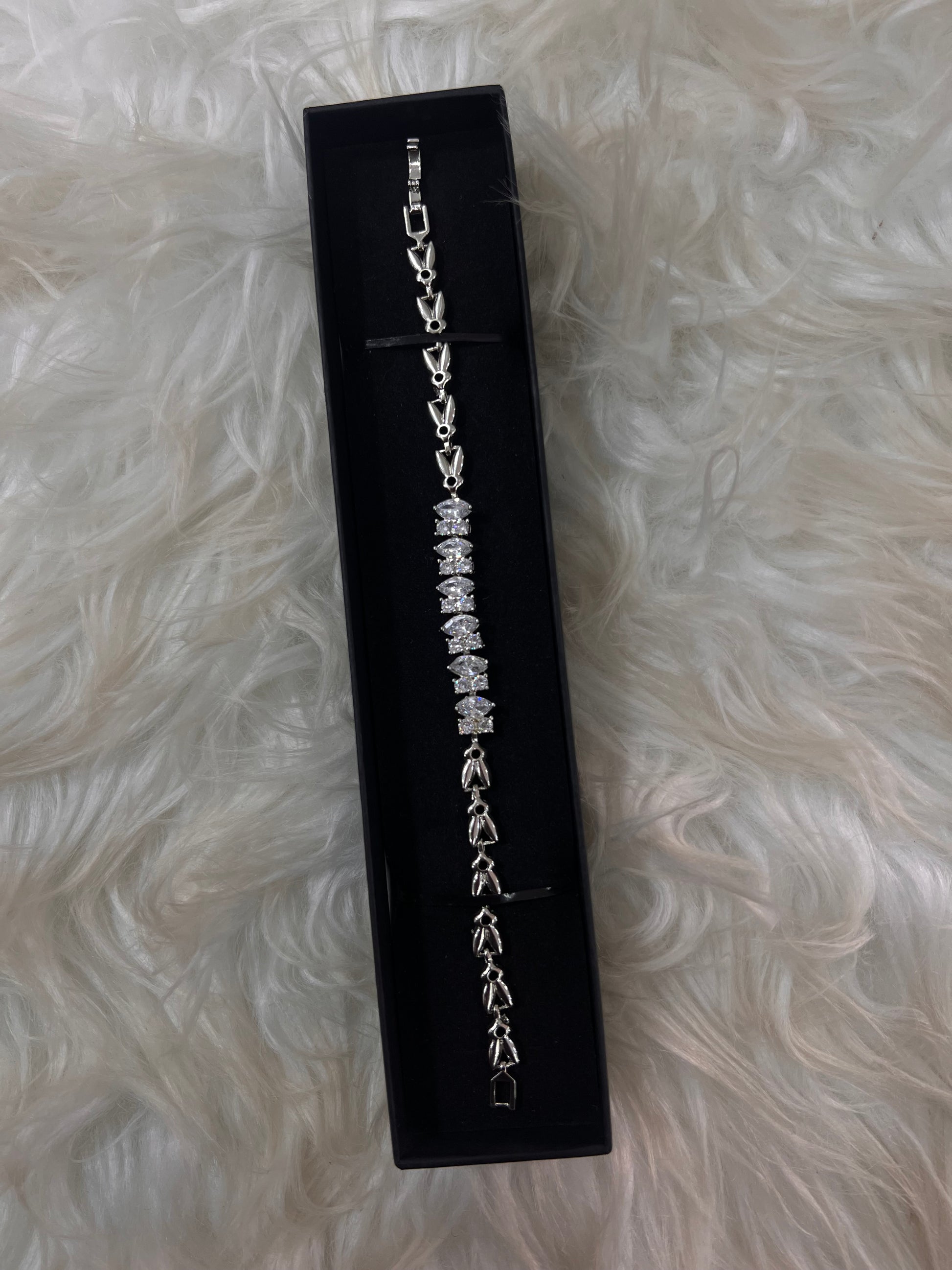 Offering a structured, high-glamour look, it provides the perfect balance of maximum sparkle and tailored sophistication for brides, bridesmaids, and formal evening galas alike.
