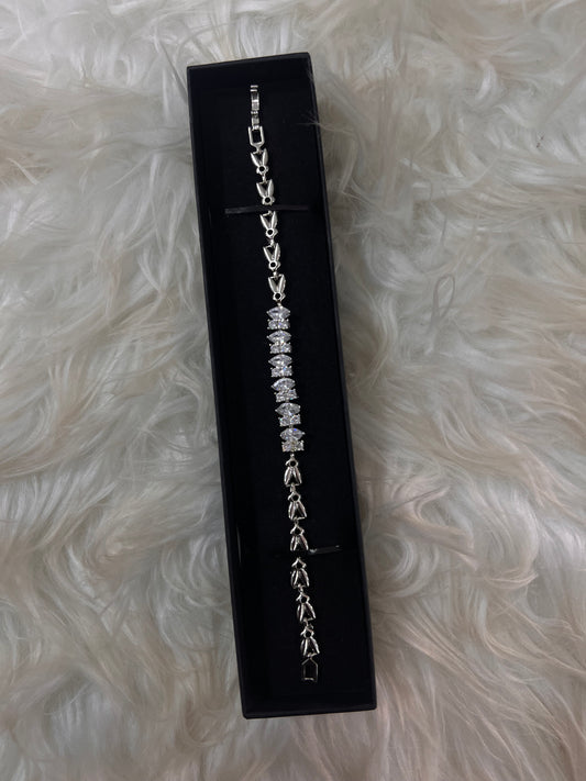 Offering a structured, high-glamour look, it provides the perfect balance of maximum sparkle and tailored sophistication for brides, bridesmaids, and formal evening galas alike.