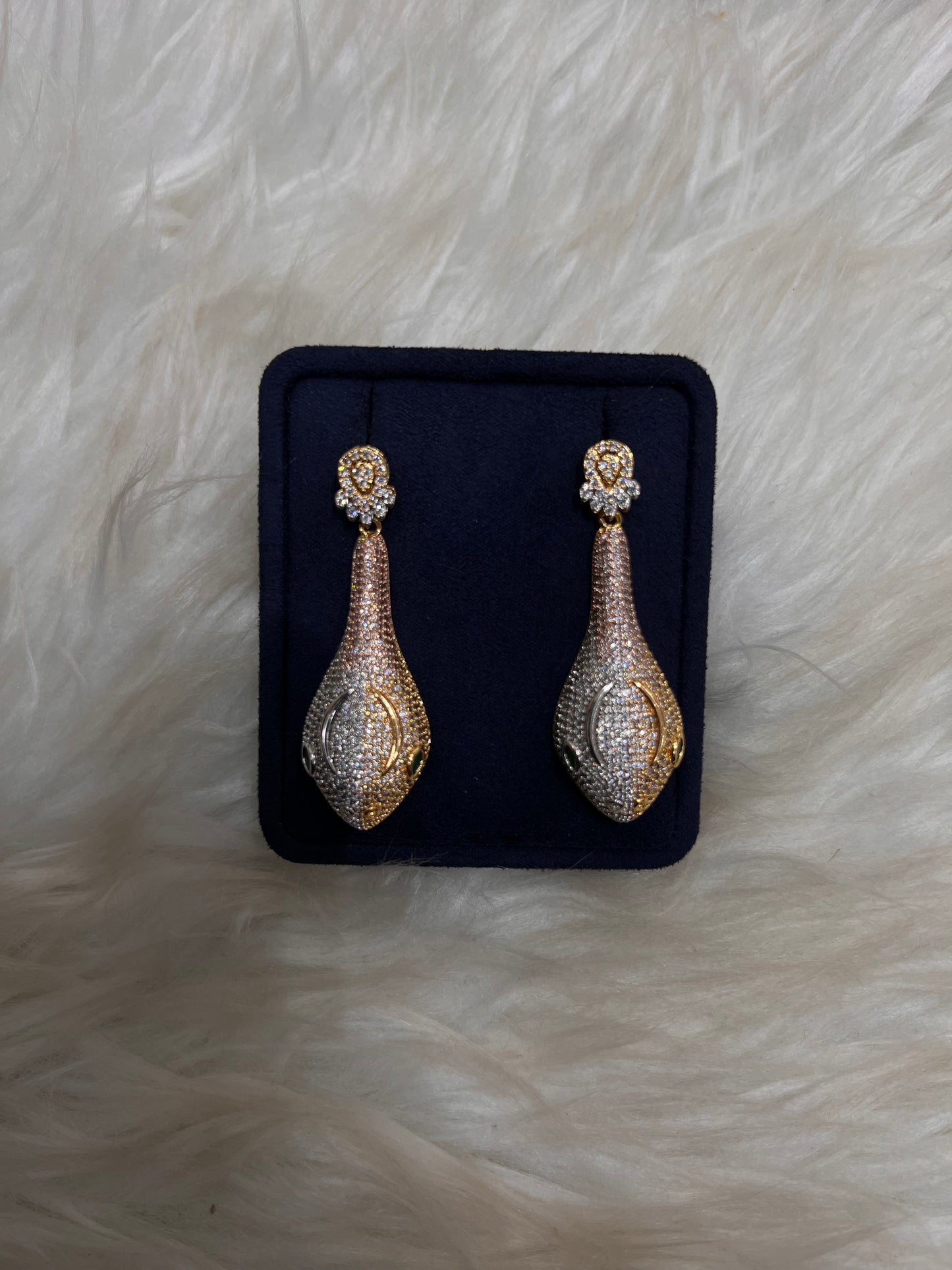 The mixed-metal design makes them incredibly adaptable to any existing jewelry collection or neckline treatment.
