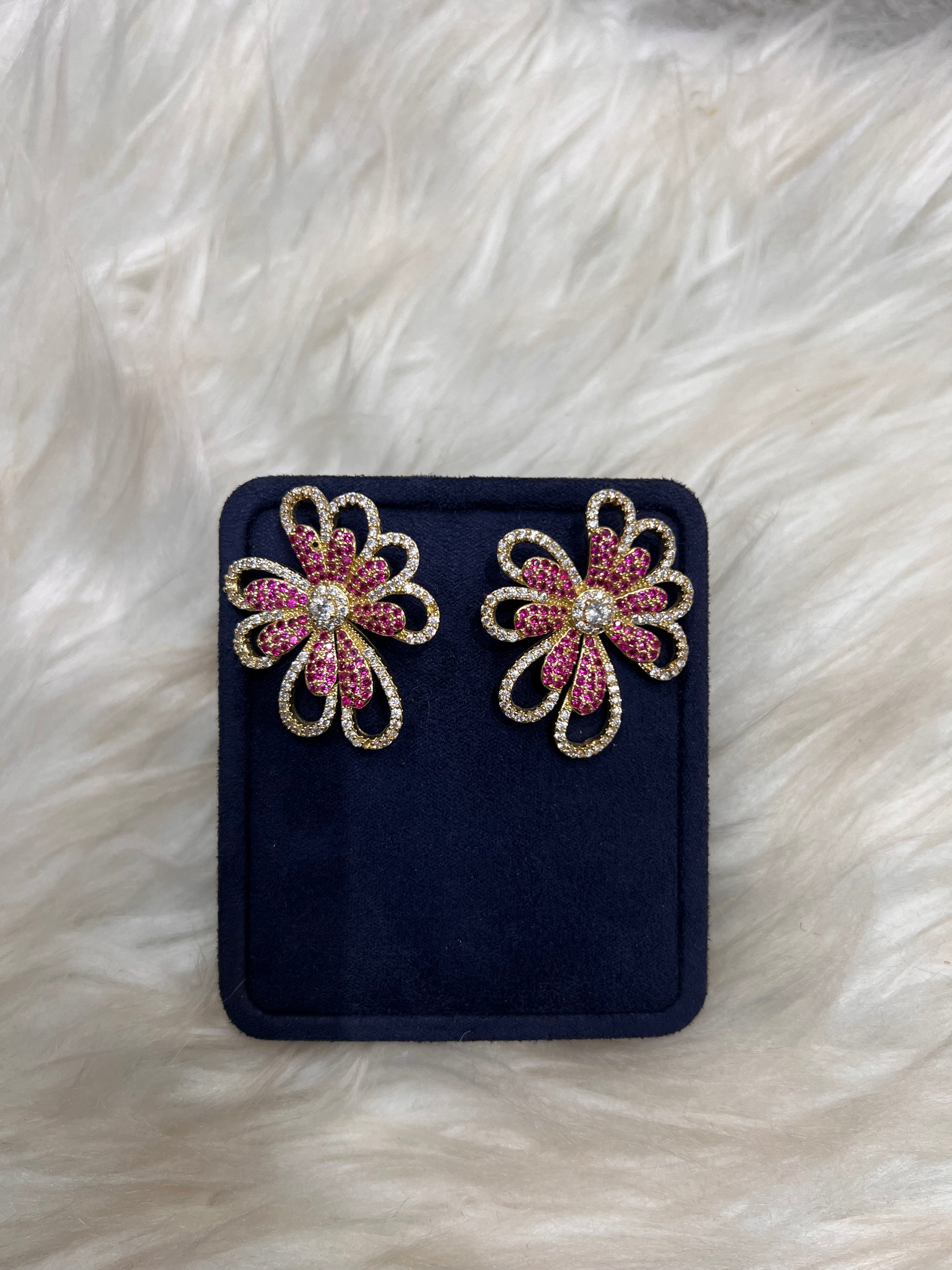 Pair of floral earrings with pink and gold . Lightweight and designed to sit flush against the lobe for effortless comfort.