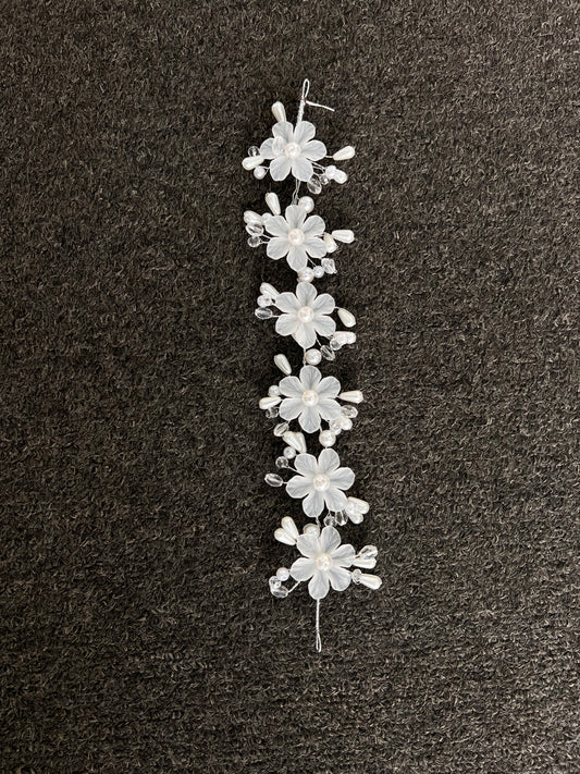 Perfect for the modern bride seeking romantic glamour, it features finished wire loops at each end to effortlessly pin into place for a comfortable, reliable fit throughout your celebration.