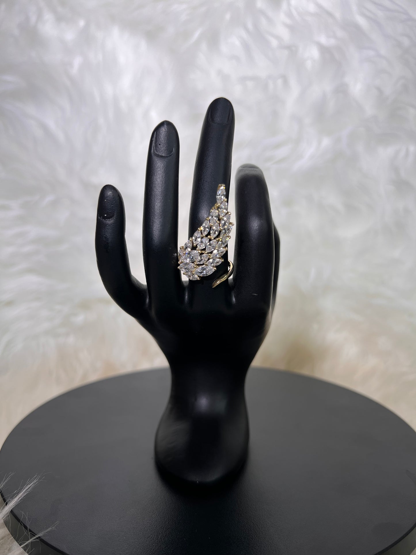 Make a fluid, high-fashion statement with our dramatic Marquise Wing Cocktail Rings. 