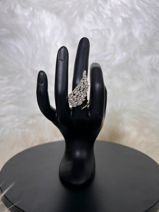 Make a fluid, high-fashion statement with our dramatic Marquise Wing Cocktail Rings. 