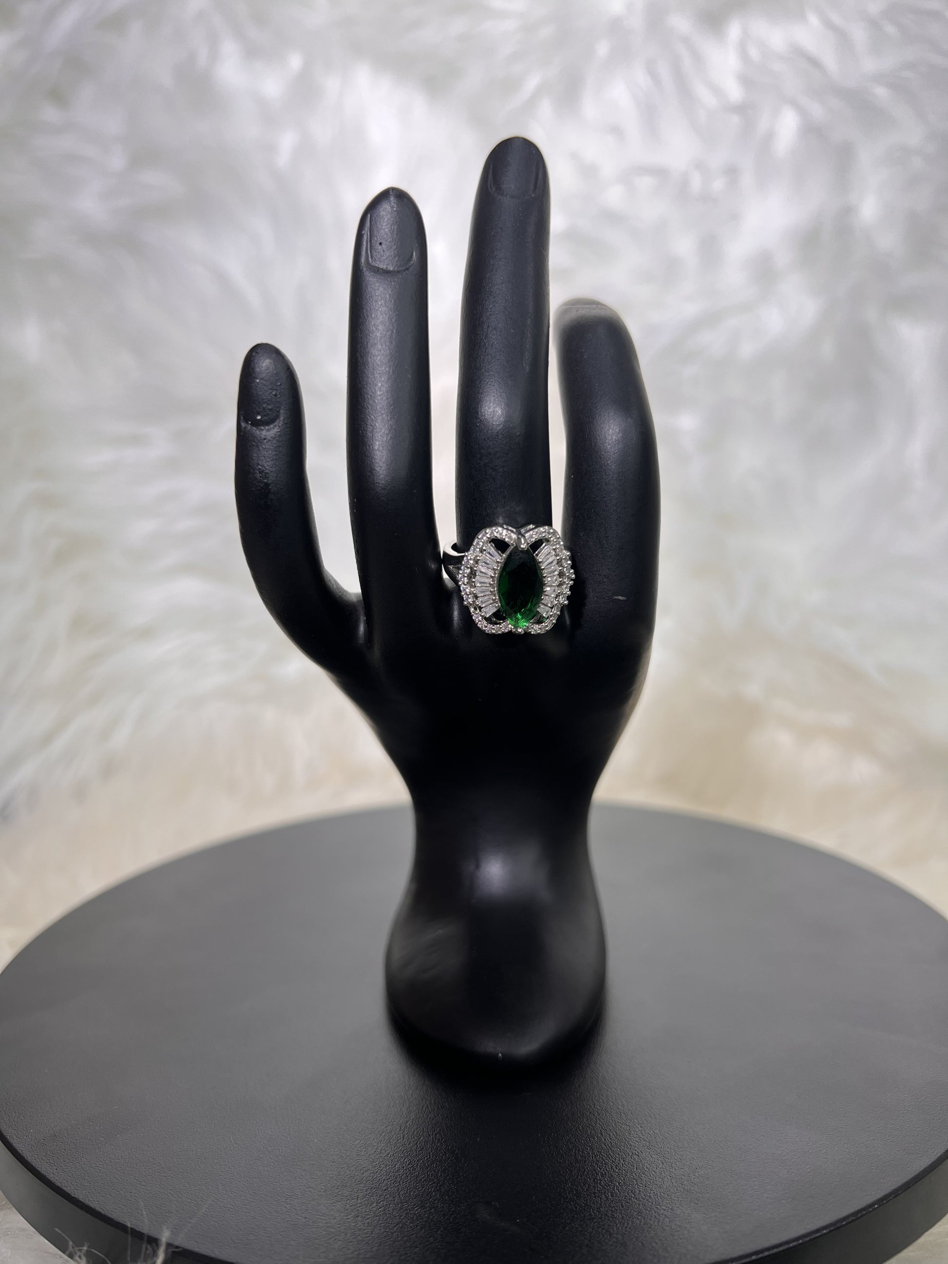 Ideal for a sophisticated bride, a glamorous bridesmaid, or an evening gala, this piece brings a magnificent pop of color and unparalleled sparkle to your look.