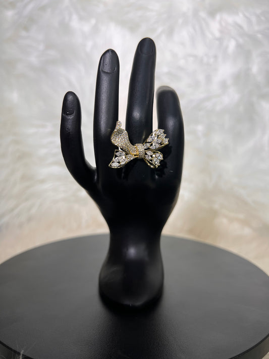 This bow cocktail ring is the perfect whimsical touch for fashion-forward brides, engagement parties, or high-fashion gala celebrations.