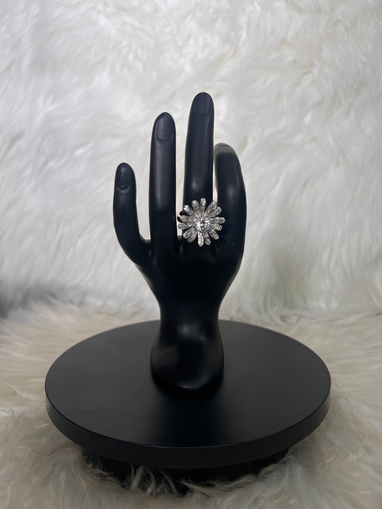 Despite its dramatic, maximalist silhouette, the ring is balanced for a lightweight feel, ensuring comfort for the duration of any event.